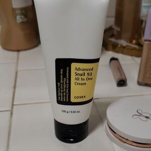 COS Advanced Snail 92 Cream in White and Black Half A Little Under Half Way Full